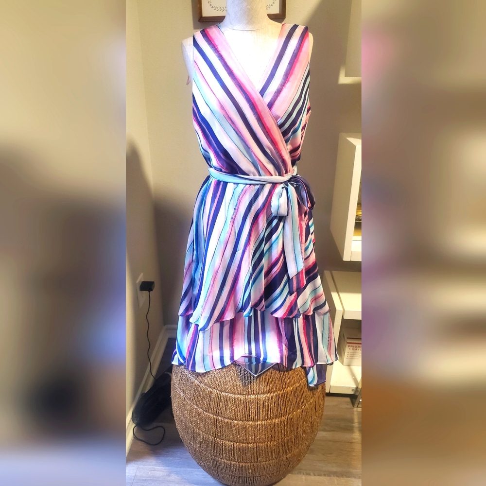 Like New Jennifer Lopez pastel colored wrap midi  dress, small.